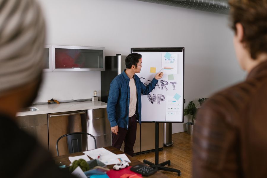 Creative team reviewing campaign content on a table